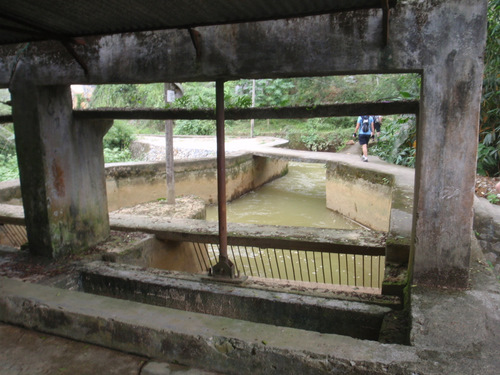 Dammed up river water, channeled in to drive the turbine.